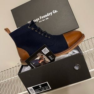 Blue denim boot with brown toe and heel designed by Vintage.